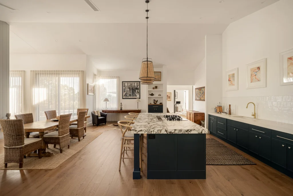 Award-Winning Entertainer's Kitchen in Belford 1 02 open plan kitchen dining navy cabinetry 2