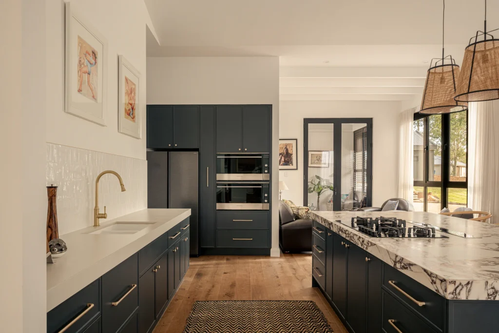 Award-Winning Entertainer's Kitchen in Belford 3 03 navy shaker kitchen tall oven tower 1