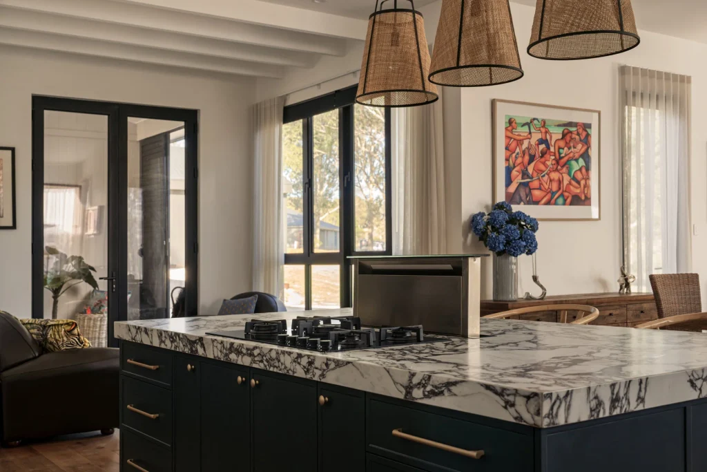 Award-Winning Entertainer's Kitchen in Belford 2 04 marble island gas cooktop downdraft 1